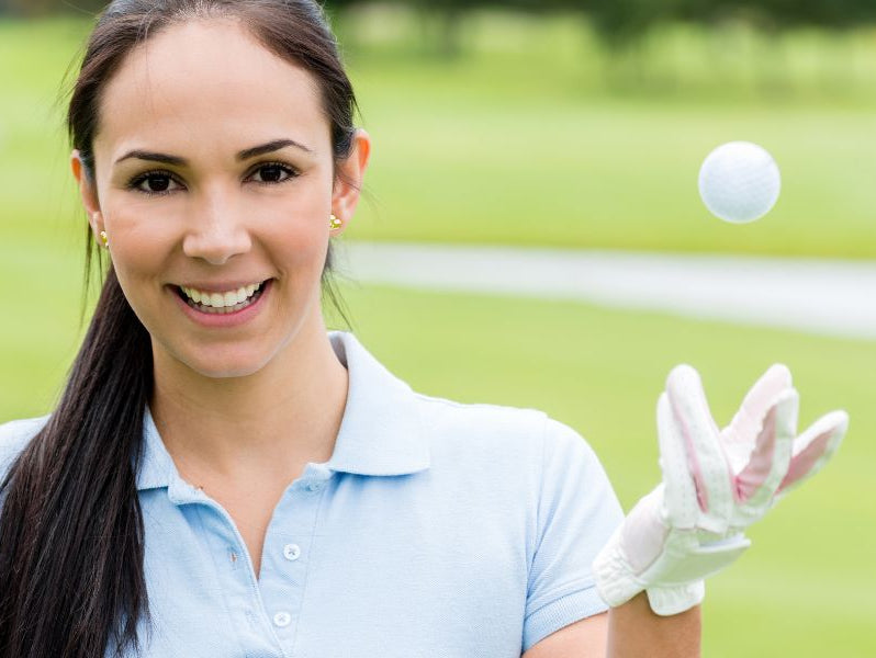 Lady throwing a golf ball