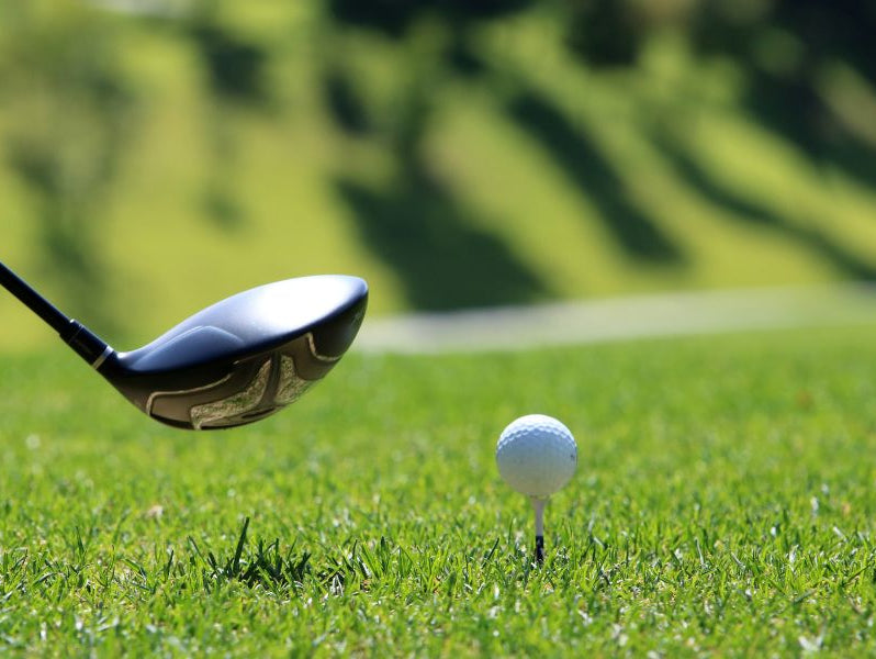 Getting ready to hit the golf ball