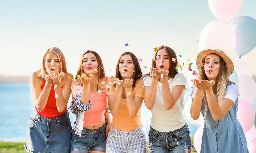 Girls wearing different women's tops