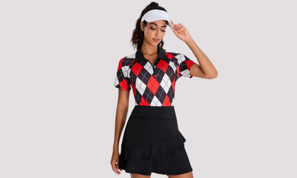 The woman wore a short-sleeved black and red checkerboard golf shirt with a black ruffled skirt